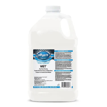 Carbrite Wet Con. High Gloss Dressing 1 Gallon bottle with label detailing usage for vinyl, rubber, and plastic surfaces.