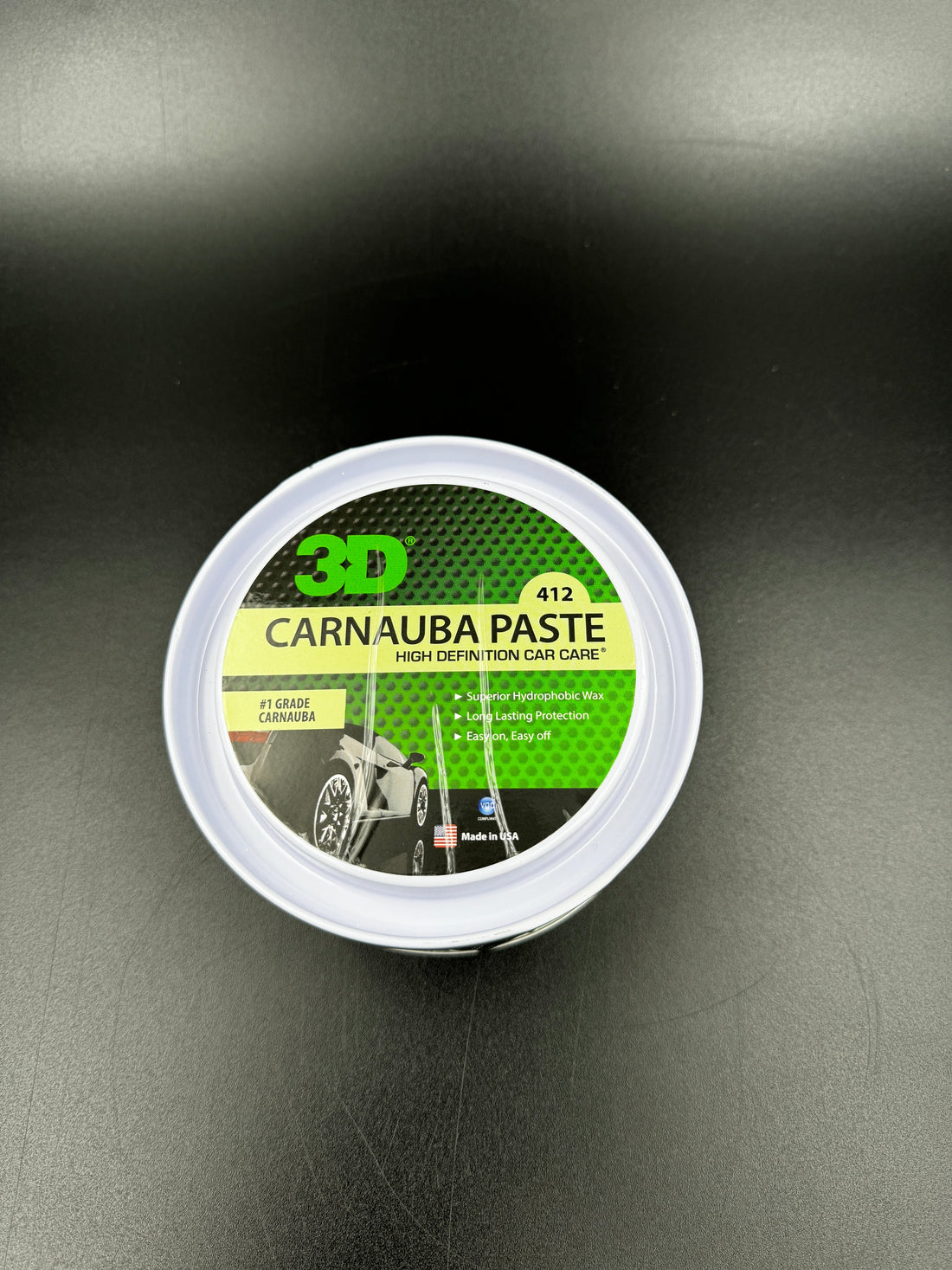 3D Paste Wax carnauba paste container on black surface.