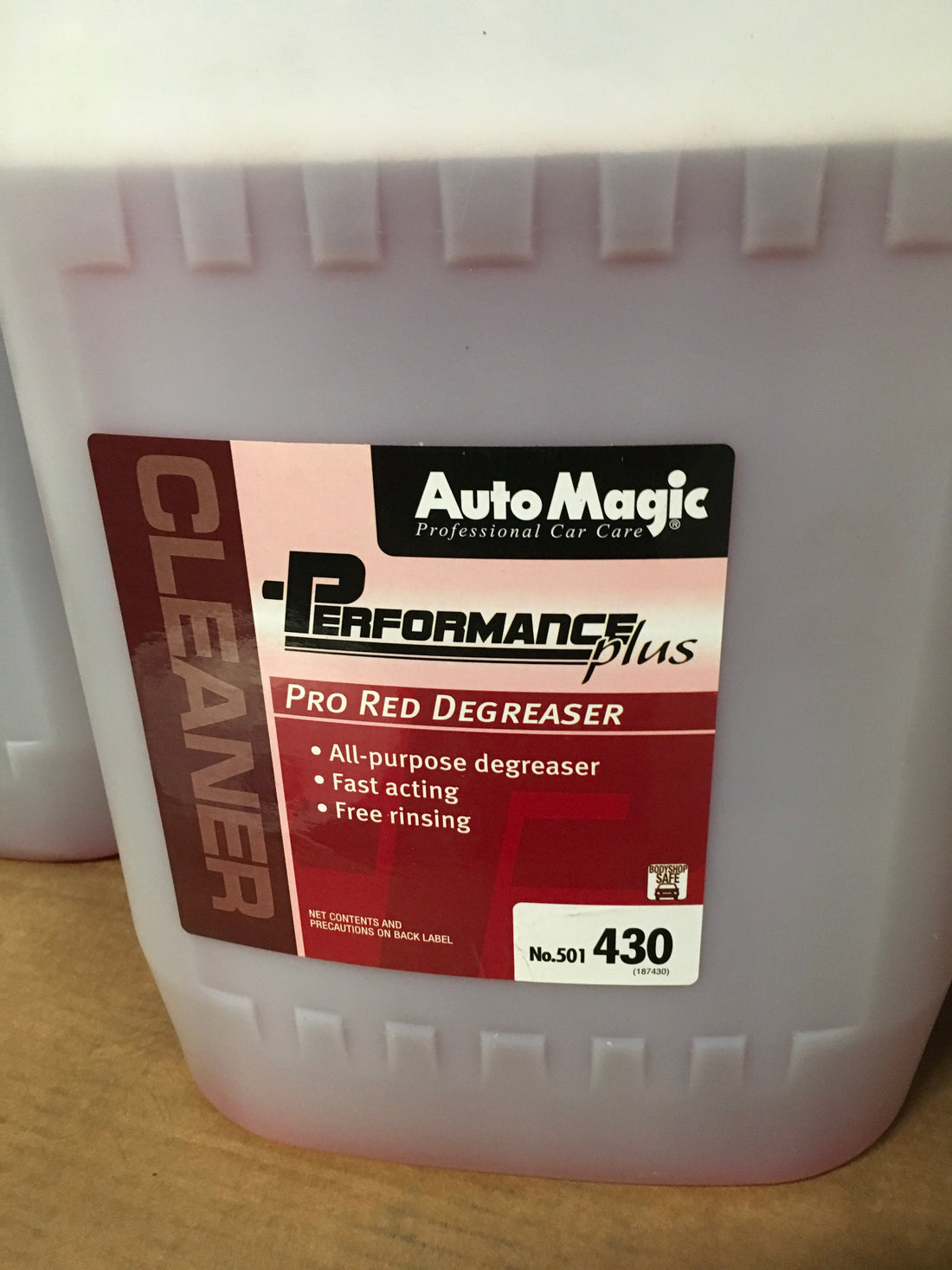 AutoMagic Pro Red Degreaser 5 Gal container with label showing product details and description.