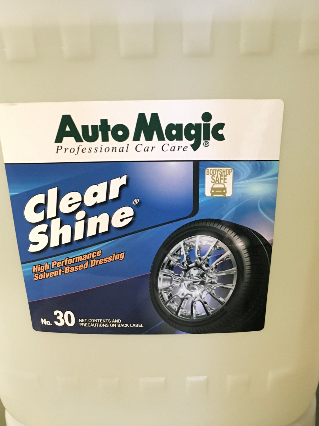 AutoMagic Clear Shine 5 Gal Sil-Free tire and rubber dressing container.