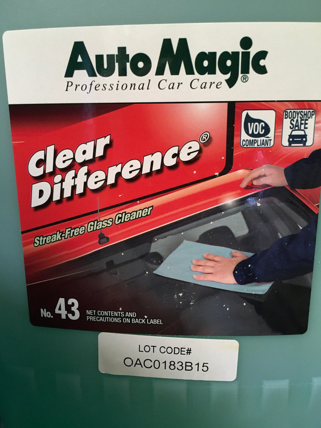 AutoMagic Clear Difference Glass Cleaner 5 Gal container with label showing streak-free cleaning performance.